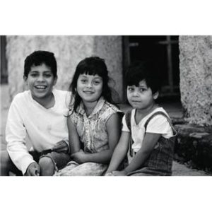 Black and white photo of 3 young children